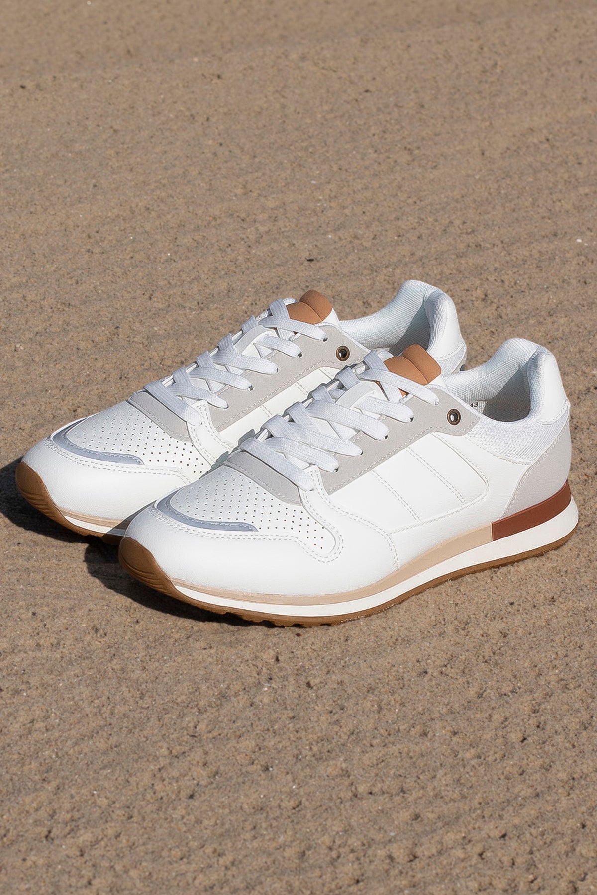 THE SANTOS ESSENTIAL SNEAKER